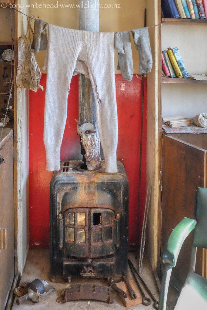 Long johns and socks abandoned drying by the fire