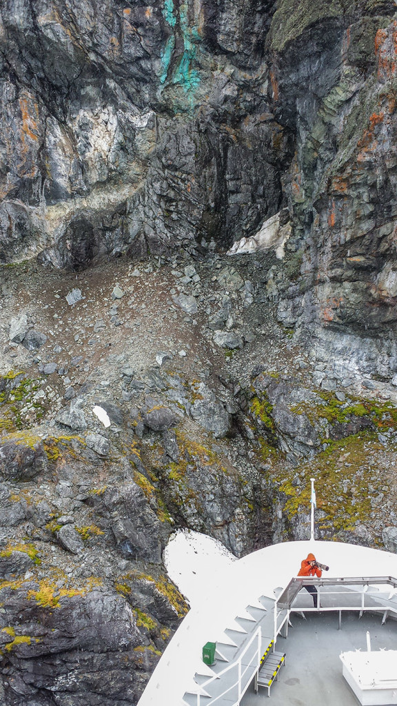 Beverly Hass' photo of me photographing Edin. Lovely textures and colours of lichens and copper deposits.