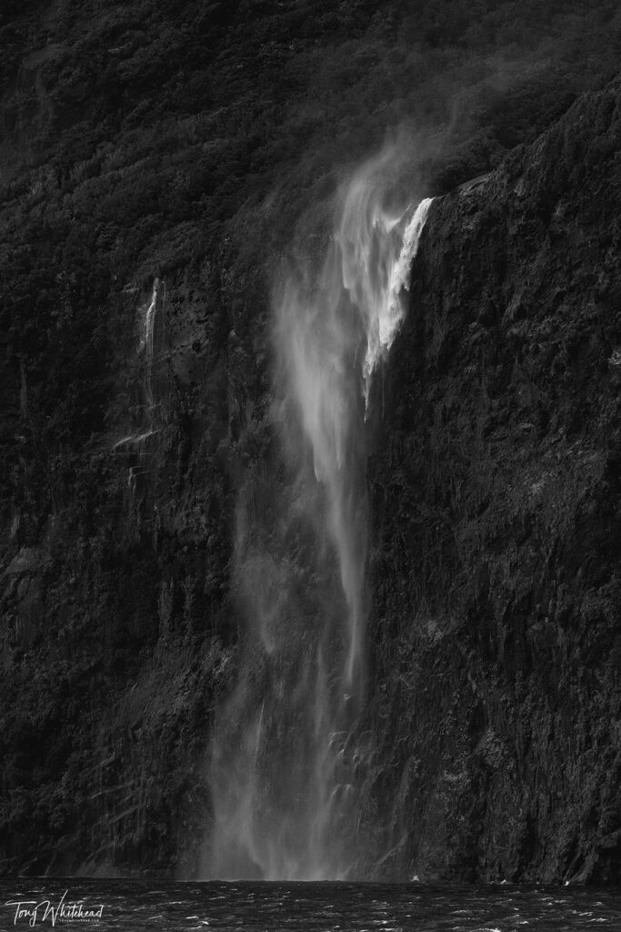 Photo of a windswept waterfall - Milford Sound/piopiotahi